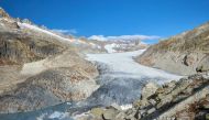 The Rhone glacier and the source of the Rhone river are seen on an autumn day in Obergoms, Switzerland, October 25, 2021. REUTERS/Denis Balibouse/File Photo