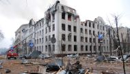 Firefighters work to extinguish a fire at the Kharkiv National University building, which city officials said was damaged by recent shelling, in Kharkiv, Ukraine March 2, 2022. REUTERS/Oleksandr Lapshyn
