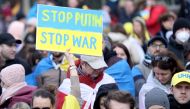 People demonstrate during an Anti-war protest called ''Stand with Ukraine'', amid Russia's invasion, in central Brussels, Belgium March 6, 2022. REUTERS/Yves Herman
