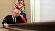 FILE PHOTO: FILE PHOTO: Russian President Vladimir Putin attends a meeting with government members via a video link in Moscow, Russia March 10, 2022. Sputnik/Mikhail Klimentyev/Kremlin via REUTERS/File Photo/File Photo
