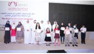 NHRC officials with the winning students of community schools. 
