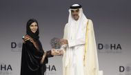 Amir H H Sheikh Tamim bin Hamad Al Thani honouring Roya Mahboob.