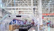 FILE PICTURE: Tesla China-made Model 3 vehicles are seen during a delivery event at its factory in Shanghai, China Jan. 7, 2020. REUTERS/Aly Song/File Photo
