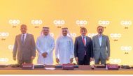Qatar Chamber (QC) Chairman Sheikh Khalifa bin Jassim Al Thani and Ambassador of the Republic of Turkey to Qatar H E Dr. Mustafa Goksu, with officials from CEO Event Qatar company, during the signing ceremony, recently. 