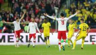 Poland's Robert Lewandowski celebrates after qualifying for the World Cup Qatar 2022 Reuters/Kacper Pempel