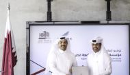 Aspire Logistics Director-General Abdulla Nasser Al Naemi and Qatar University Head of Strategy and Development, Dr. Khaled Al Khanji, after signing the agreement.