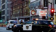 Police are seen after an early-morning shooting in a stretch of the downtown near the Golden 1 Center arena in Sacramento, California, U.S. April 3, 2022. REUTERS/Fred Greaves
