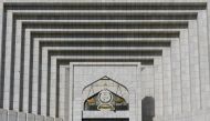 A general view of balance scale with the logo, that reads in Arabic, 
