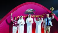 H E Sheikh Thani bin Hamad Al Thani presented the Qatar Gold Sword to Abdulla Rashid Al Kubaisi, who was representing Umm Qarn, owner of Abbes.