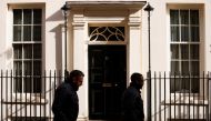 People walk past 11 Downing Street, the official residence of British Chancellor of the Exchequer Rishi Sunak, in London, Britain April 11, 2022. REUTERS/John Sibley
