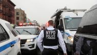 A police officer works near the scene of a shooting at a subway station in the Brooklyn borough of New York City, New York, U.S., April 12, 2022. REUTERS/Brendan McDermid