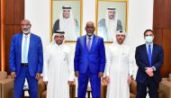 QU President, Dr. Hassan Al Derham (second left); Chairman of the Board of Trustees of Mogadishu University, Dr. Abdurahman Moallim Abdullahi; and other officials on the occasion of signing the MoU. 
