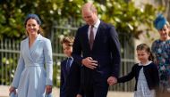 Britain's Prince William and Catherine, Duchess of Cambridge, walk with Prince George and Princess Charlotte as they arrive for the Easter Mattins Service at St George's Chapel at the Windsor Castle in Windsor, Britain April 17, 2022. Andrew Matthews/Pool via REUTERS
