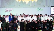 Director of General Department of Endowments Dr. Sheikh Khalid bin Mohammed bin Ghanem Al Thani and other officials with graduating students and new recipients of Qatar Scholarship Programme. 