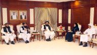 Minister of Social Development and Family H E Maryam bint Ali bin Nasser Al Misnad meeting Afghanistan's Acting Minister of Foreign Affairs H E Amir Khan Muttaqi and Acting Minister of Information and Culture H E Khairullah Khairkhwa, in Doha, yesterday.