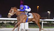 Jockey Alberto Sanna guides Usak towards the finish line.