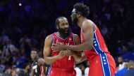 Philadelphia 76ers guard James Harden (1) reacts with center Joel Embiid (21) after a score against the Miami Heat during the second quarter in game four of the second round for the 2022 NBA playoffs at Wells Fargo Center. Bill Streicher 