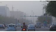 Motorists driving through the dust storm, which covered the entire Gulf region, in Doha yesterday. Pic:Salim Matramkot/the Peninsula
