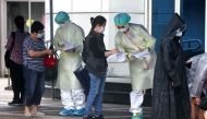 People wait to get a coronavirus disease (COVID-19) test in Taipei, Taiwan, May 24, 2022. REUTERS/Ann Wang

