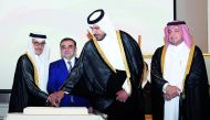 From left: Minister of State and President of Qatar National Library H E Dr. Hamad bin Abdulaziz Al Kuwari; Ambassador of Azerbaijan to Qatar Rashad Ismayilov and Minister of Commerce and Industry H E Sheikh Mohammed bin Hamad bin Qassim Al Abdullah Al Thani, jointly cutting a cake to mark the National Day of Azerbaijan at the JW Marriott Marquis City Centre Hotel on Thursday. Director of Protocol Department at the Ministry of Foreign Affairs, Ambassador H E Ibrahim Yousif Fakhroo (right), and diplomats from various countries were also present.  Pic: Salim Matramkot/The Peninsula