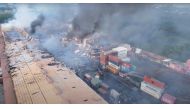 Drone footage shows smoke rising from the spot after a massive fire broke out in an inland container depot at Sitakunda, near the port city Chittagong, Bangladesh, June 5, 2022 in this still image obtained from a handout video. Al Mahmud BS/Handout via REUTERS