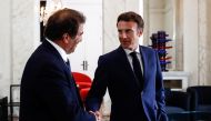 French President Emmanuel Macron shakes hands with Christian Jacob, head of the French conservative party Les Republicains (LR), after their meeting at the Elysee Palace in Paris, France, June 21, 2022. Mohammed Badra/Pool via Reuters