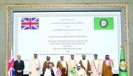 H E Anne-Marie Trevelyan, Minister of International Trade in the United Kingdom, Undersecretary of the Ministry of Commerce and Industry H E Sultan bin Rashid Al Khater, with other officials, during the signing ceremony, yesterday. 