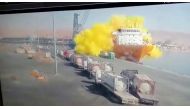 CCTV footage shows a storage tank containing chlorine gas crashing into a ship after falling from a winch, in Aqaba, Jordan June 27, 2022, in this still image taken from a handout video. Jordan TV/Handout via Reuters