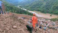 Members of rescue teams search for survivors after a landslide in Noney in the northeastern state of Manipur, India, June 30, 2022. National Disaster Response Force/Handout via REUTERS