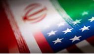 Iran and U.S. flags are seen printed on paper in this illustration taken January 27, 2022. REUTERS/Dado Ruvic/Illustration//File Photo