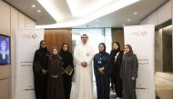Qatar University students with officials during their visit to the Commercial Bank.