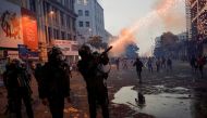 Police use tear gas and water cannons to disperse demonstrators near President's residence during a protest demanding the resignation of President Gotabaya Rajapaksa, amid the country's economic crisis, in Colombo, Sri Lanka, July 8, 2022. REUTERS/Dinuka Liyanawatte 