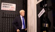 A wax figure of Boris Johnson is pictured next to a 'vacancy' sign on 10 Downing Street at Madame Tussauds, in London, Britain July 7, 2022. (Madame Tussauds London)