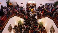 Demonstrators protest inside the President's House premises, after President Gotabaya Rajapaksa fled, amid the country's economic crisis, in Colombo, Sri Lanka July 9, 2022. (REUTERS/Dinuka Liyanawatte)