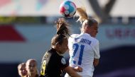  Iceland's Svava Ros Gudmundsdottir in action with Belgium's Sari Kees. (REUTERS/Molly Darlington)
