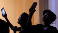 People take pictures inside President Gotabaya Rajapaksa's house in Colombo, Sri Lanka, on July 11, 2022. (REUTERS/Dinuka Liyanawatte)