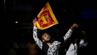 People dance as they celebrate the resignation of Sri Lanka’s President Gotabaya Rajapaksa at a protest site, amid the country’s economic crisis, in Colombo, Sri Lanka July 14, 2022. REUTERS/Adnan Abidi 