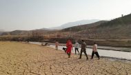 Rescuers work following the flood in Estahban county in southern Iran July 23, 2022. Iranian Red Crescent Society/WANA (West Asia News Agency)/Handout via REUTERS ATTENTION EDITORS - THIS IMAGE HAS BEEN SUPPLIED BY A THIRD PARTY.