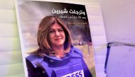 File Photo: A picture of Al Jazeera reporter Shireen Abu Akleh. (REUTERS/Imad Creidi)