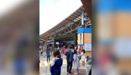 Crowds of people stand on the side of the road, following an earthquake in Baguio City, Philippines July 27, 2022 in this screen grab obtained from social media video. Clarence Bantog/via REUTERS