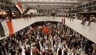 Supporters of Iraqi Shi'ite cleric Moqtada al-Sadr protest against corruption inside the parliament building in Baghdad, Iraq, July 27, 2022. (REUTERS/Ahmed Saad)
