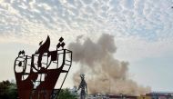 Smoke rises from the newly collapsed part of the Beirut grain silos damaged during August 2020 blast as Lebanon marks the two-year anniversary of the explosion, in Beirut, Lebanon, August 4, 2022. (REUTERS/Issam Abdallah)