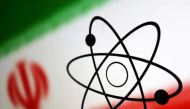 Atom symbol and Iran flag are seen in this illustration, July 21, 2022. REUTERS/Dado Ruvic/Illustration