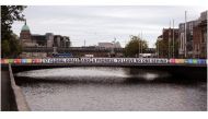 United Nations Sustainable Development 17 Global Goals banner displayed across Dublin’s Rosie Hackett Bridge over the River Liffey, Ireland.