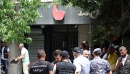 Members of security forces secure the area outside Federal bank of Lebanon, in Hamra, Lebanon August 11, 2022. Reuters/Mohamed Azakir