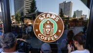 People gather for the launching of the new coffee shop 