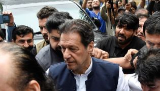 Pakistan's former Prime Minister Imran Khan, who is facing terrorism charges, appears in court to extend pre-arrest bail, in Islamabad, on August 25, 2022. REUTERS/Waseem Khan 