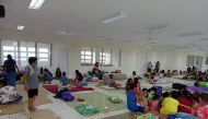 Residents are seen inside an evacuation centre in Aurora Province, Philippines, September 25, 2022 in this picture obtained from social media. Ricardo Balala Jr./via Reuters