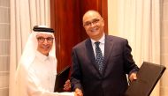 Chairman of Qatar Tourism and Qatar Airways Group Chief Executive H E Akbar Al Baker (left) and Ayla Oasis Development Managing Director Sahl Dudin during the signing of the agreement.