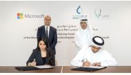 Abdulaziz Al Mannai (front right), Executive Vice-President, Human Capital of QatarEnergy and Lana Khalaf (front left), Country General Manager at Microsoft Qatar sign the Mou, as Abdulaziz Al Muftah, Executive Vice-President, Industrial Cities of QatarEnergy and Samer Abu Ltaif, Corporate Vice-President and President of Microsoft Mea region look on. 